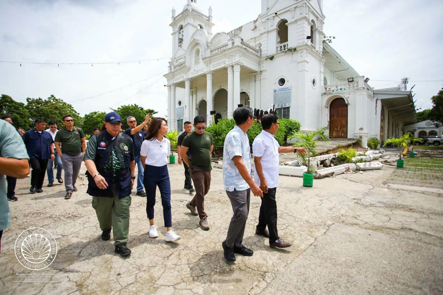 DOT officials, including secretary Christina Frasco, join the President in an inspection of quake-hit Bogo City (Department of Tourism)
